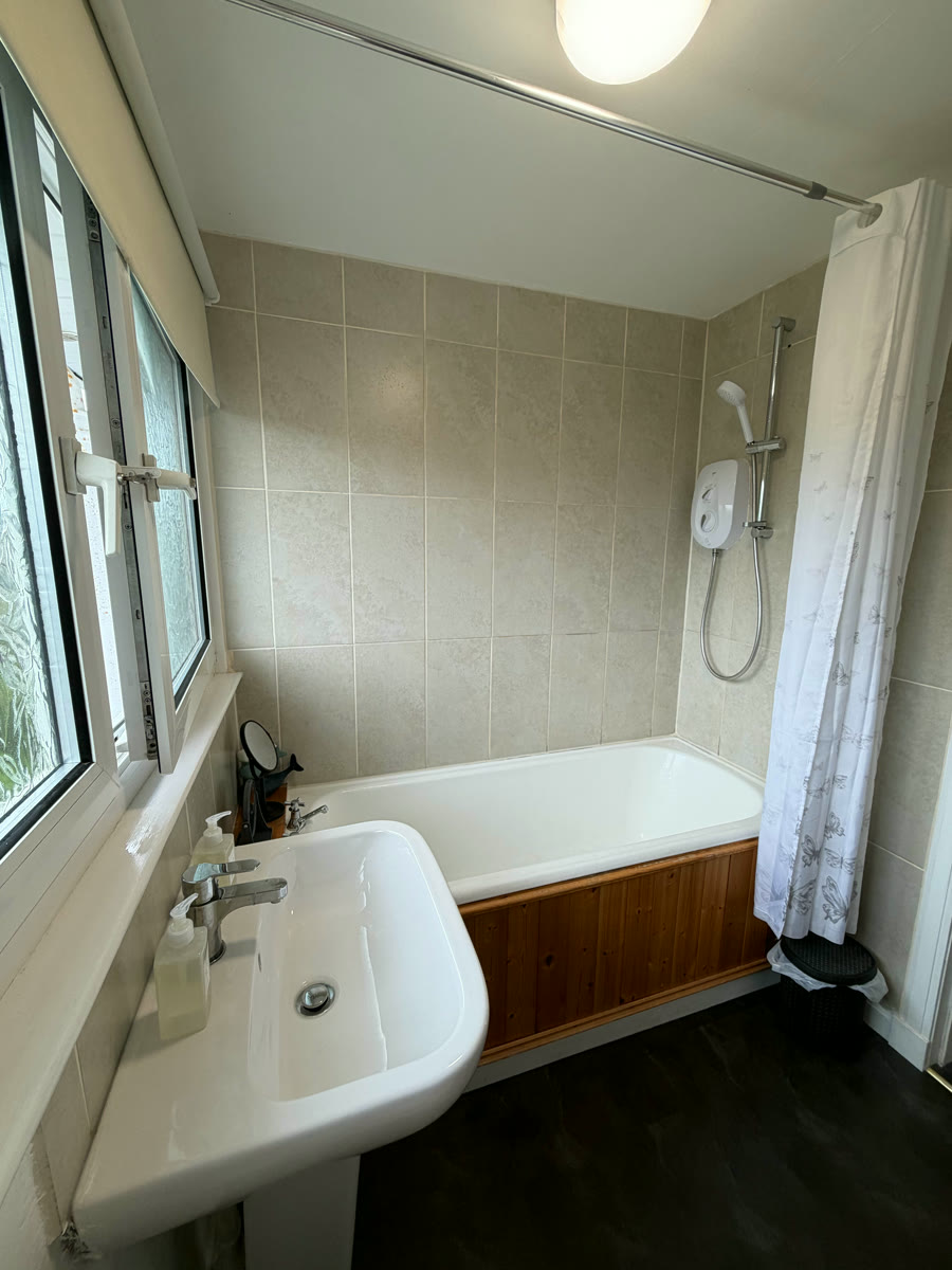 Walk-in shower enclosure in Inverness self-catering holiday home bathroom